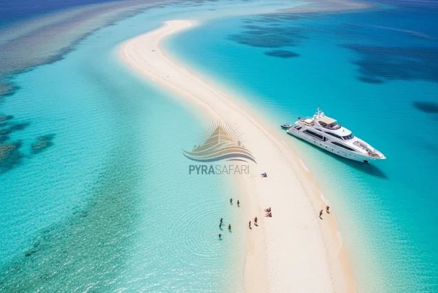 Aerial view of White Island, a pristine sandbank near Ras Mohammed, Red Sea, with a luxury yacht and snorkelers.