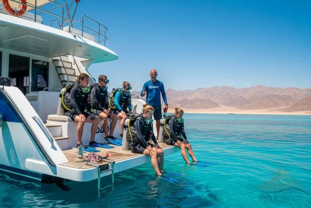Luxury PADI Open Water Diving Course boat in Sharm El Sheikh Red Sea with divers preparing to enter the water.